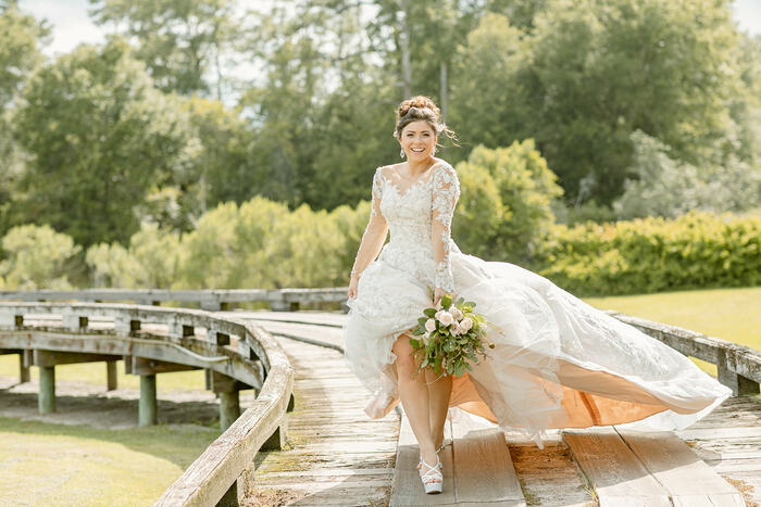 view of the bride on the cart path